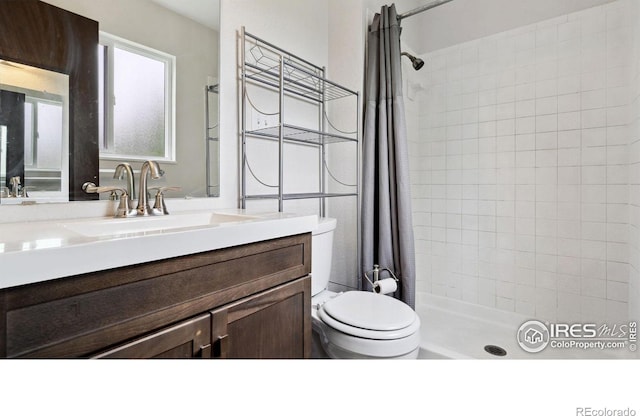 2013 Ridgewood Rd, Fort Collins, CO 80526 - bathroom featuring vanity and a tile shower