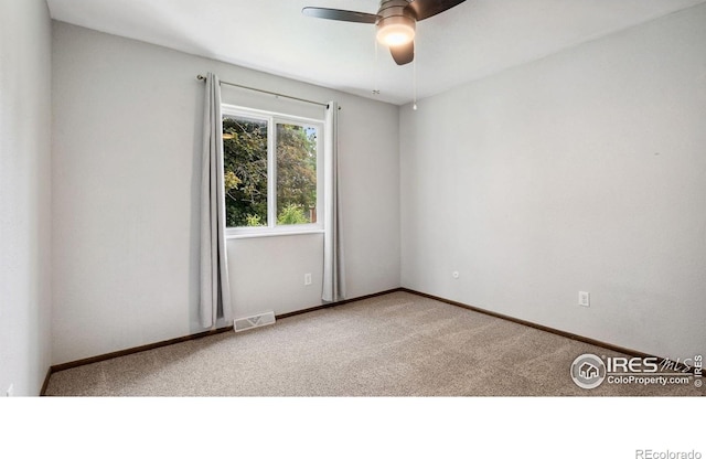 2013 Ridgewood Rd, Fort Collins, CO 80526 - spare room with carpet flooring and ceiling fan