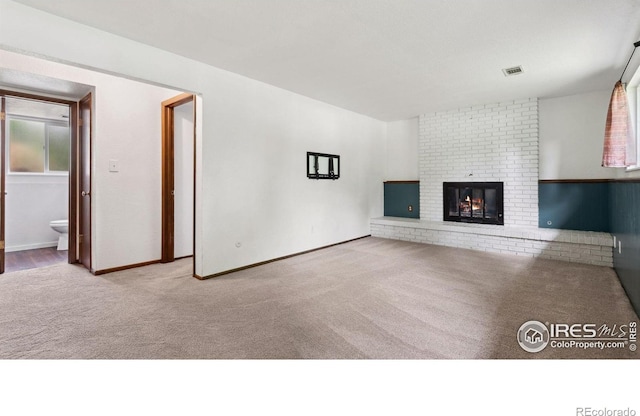 2013 Ridgewood Rd, Fort Collins, CO 80526 - unfurnished living room with carpet and a fireplace