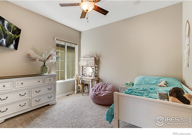 2050 Vineyard Dr, Windsor, CO 80550 - bedroom with light colored carpet and ceiling fan