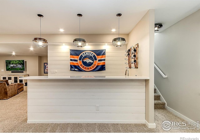 2050 Vineyard Dr, Windsor, CO 80550 - detailed view of carpet flooring and wet bar