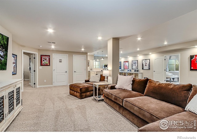 2050 Vineyard Dr, Windsor, CO 80550 - living room with light carpet and recessed lighting