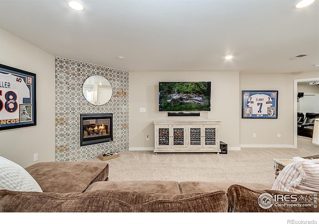 2050 Vineyard Dr, Windsor, CO 80550 - living room featuring carpet, a fireplace, and recessed lighting