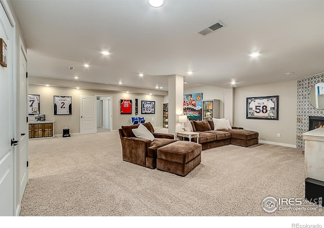 2050 Vineyard Dr, Windsor, CO 80550 - living area featuring carpet, a fireplace, and recessed lighting