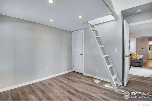 4763 White Rock Cir Unit A, Boulder, CO 80301 - unfurnished bedroom featuring wood finished floors and recessed lighting