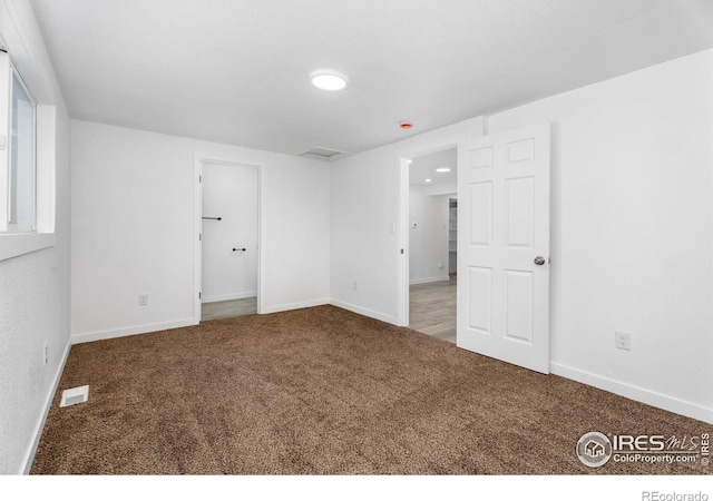 1111 Wabash St, Denver, CO 80220 - unfurnished bedroom featuring carpet flooring and baseboards