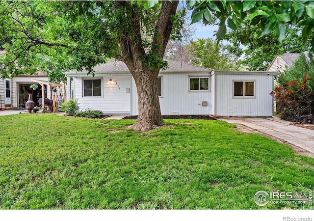1111 Wabash St, Denver, CO 80220 - view of front of house featuring a front lawn