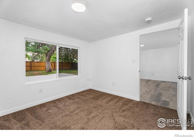 1111 Wabash St, Denver, CO 80220 - carpeted spare room with a smoke detector and baseboards