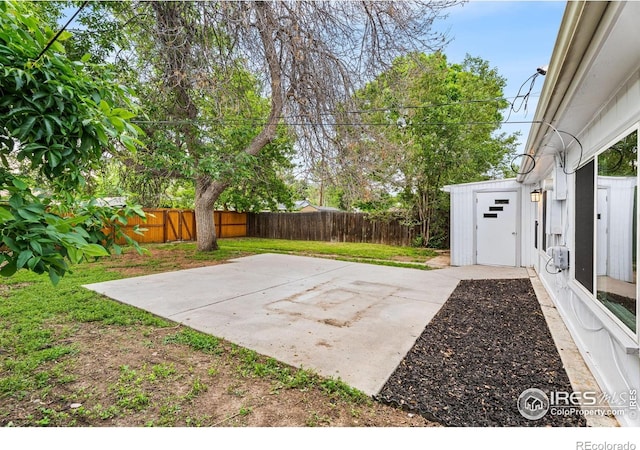 1111 Wabash St, Denver, CO 80220 - fenced backyard with a patio area