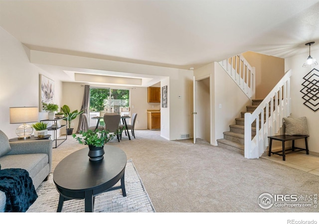 4255 Westshore Way Unit 19, Fort Collins, CO 80525 - living area with stairway and light carpet