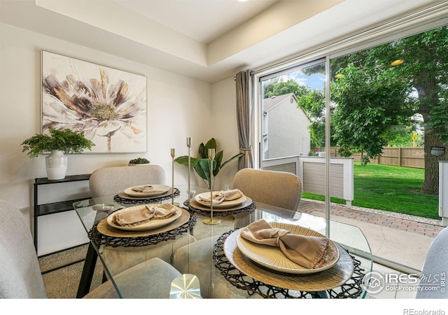 4255 Westshore Way Unit 19, Fort Collins, CO 80525 - dining space with a tray ceiling