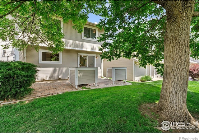 4255 Westshore Way Unit 19, Fort Collins, CO 80525 - rear view of house with a yard