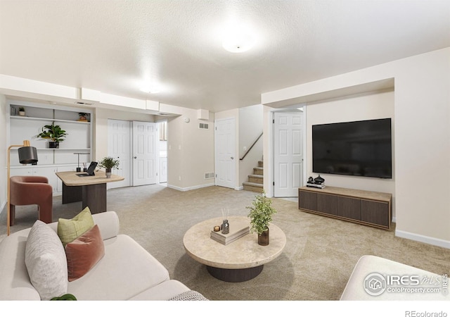 4255 Westshore Way Unit 19, Fort Collins, CO 80525 - living room featuring carpet flooring and stairs