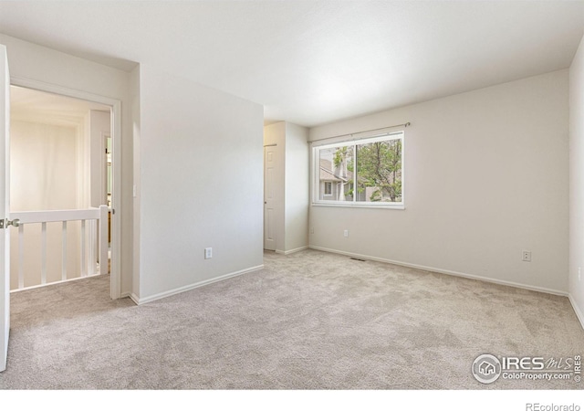 4255 Westshore Way Unit 19, Fort Collins, CO 80525 - unfurnished bedroom with carpet flooring and baseboards