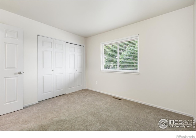 4255 Westshore Way Unit 19, Fort Collins, CO 80525 - unfurnished bedroom with carpet floors and a closet