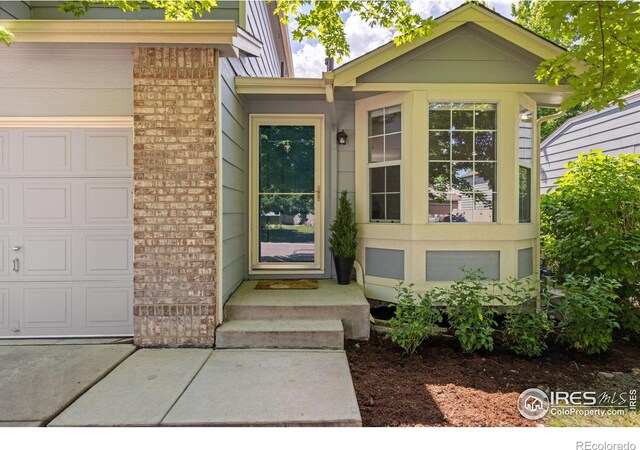 1667 Reliance Cir, Superior, CO 80027 - property entrance with brick siding