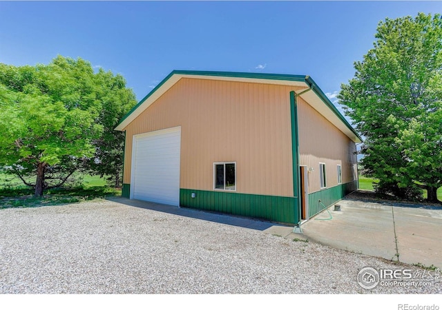 8943 Gander Valley Ln, Windsor, CO 80550 - view of property exterior featuring a garage and an outdoor structure