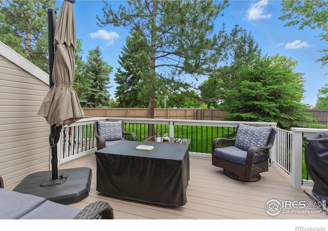 4255 Westshore Way Unit B4, Fort Collins, CO 80525 - wooden terrace with a fenced backyard