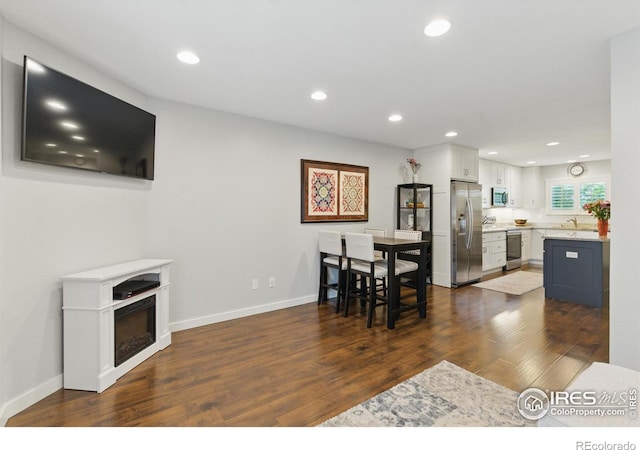 4255 Westshore Way Unit B4, Fort Collins, CO 80525 - dining room featuring recessed lighting, dark wood finished floors, and a fireplace