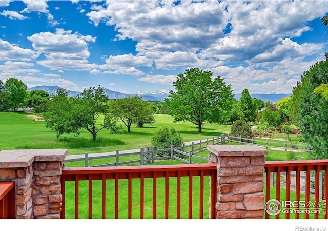 2226 Eagles Nest Dr, Lafayette, CO 80026 - deck featuring a fenced backyard and a mountain view