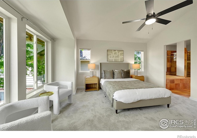2226 Eagles Nest Dr, Lafayette, CO 80026 - bedroom with carpet flooring, vaulted ceiling, ensuite bath, and ceiling fan