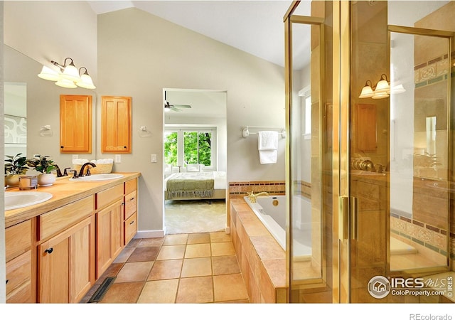 2226 Eagles Nest Dr, Lafayette, CO 80026 - ensuite bathroom featuring a bath, double vanity, a ceiling fan, a stall shower, and tile patterned flooring