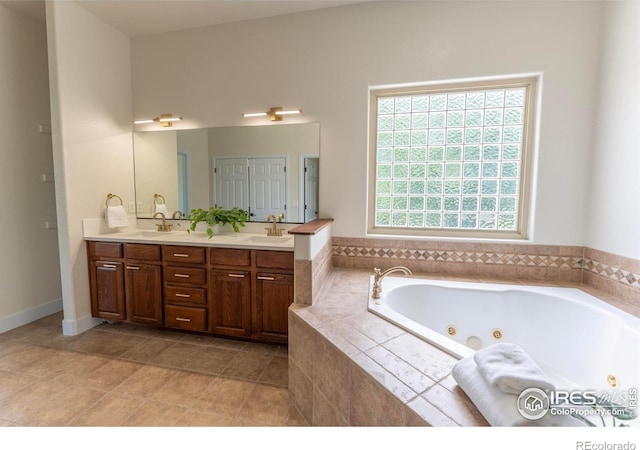 5217 Dry Creek Rd, Evans, CO 80634 - full bathroom featuring double vanity and a jetted tub