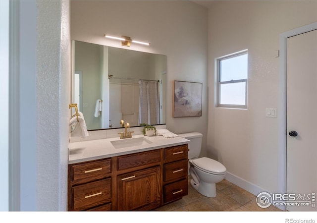 5217 Dry Creek Rd, Evans, CO 80634 - full bath with vanity, tile patterned flooring, and curtained shower