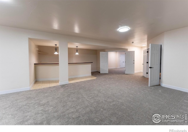 5217 Dry Creek Rd, Evans, CO 80634 - spare room featuring light carpet and baseboards