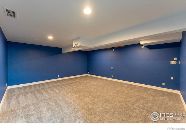 5217 Dry Creek Rd, Evans, CO 80634 - finished basement with carpet flooring and recessed lighting
