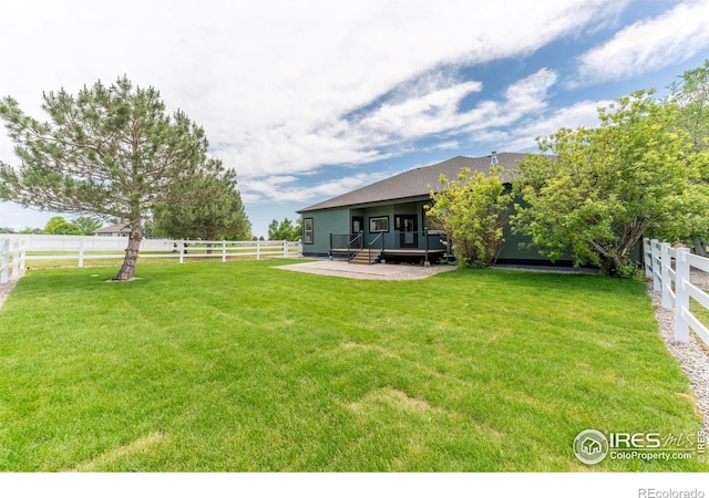 5217 Dry Creek Rd, Evans, CO 80634 - fenced backyard featuring a deck