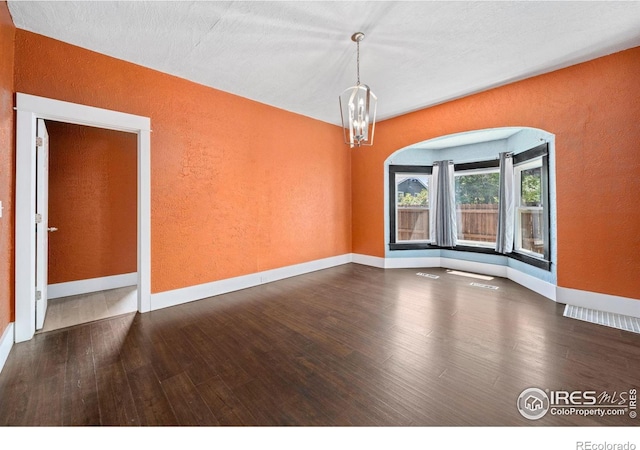 556 Lincoln Ave, Nunn, CO 80648 - spare room featuring a textured wall and wood finished floors