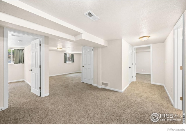 556 Lincoln Ave, Nunn, CO 80648 - spare room featuring carpet flooring and a textured ceiling