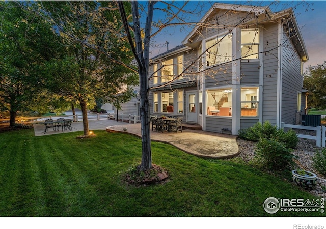 8383 Castaway Dr, Windsor, CO 80528 - back of property featuring a patio area