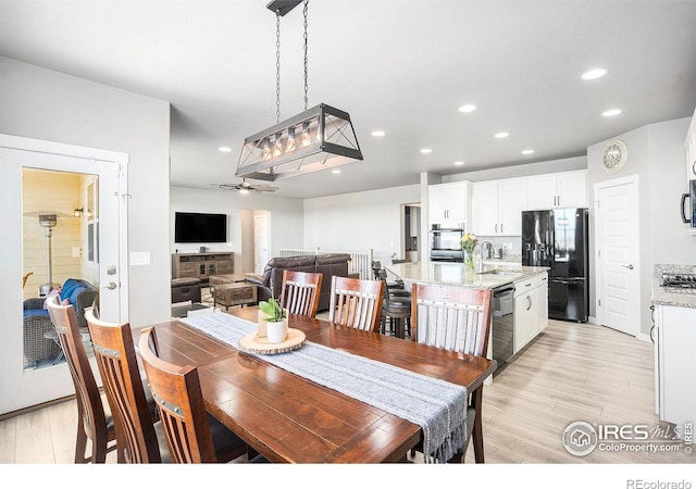 973 Mt Andrew Dr, Severance, CO 80550 - dining room with light wood finished floors, recessed lighting, and ceiling fan
