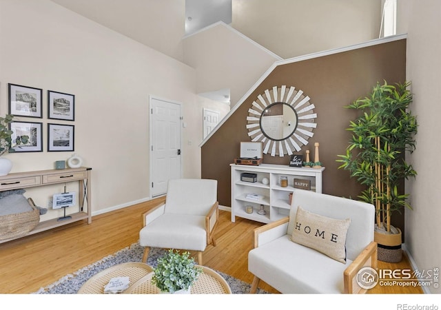 3826 Glenarbor Ln Unit F, Fort Collins, CO 80524 - sitting room with wood finished floors and high vaulted ceiling