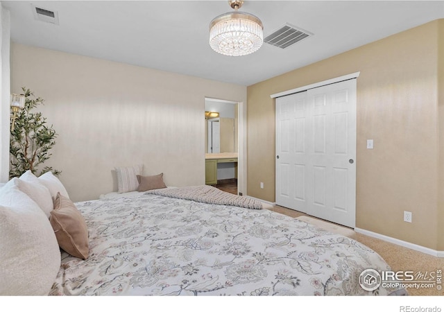 3826 Glenarbor Ln Unit F, Fort Collins, CO 80524 - bedroom with a chandelier, a closet, and ensuite bathroom