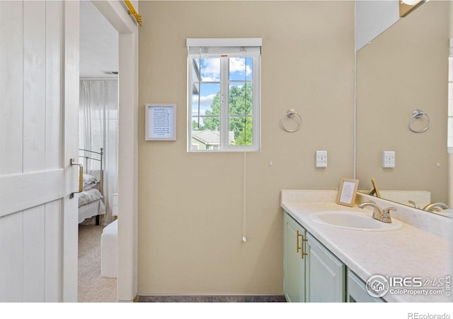 3826 Glenarbor Ln Unit F, Fort Collins, CO 80524 - bathroom featuring vanity and connected bathroom