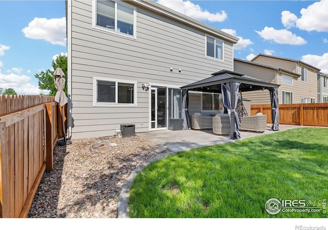 3826 Glenarbor Ln Unit F, Fort Collins, CO 80524 - rear view of house featuring a gazebo, a patio area, a fenced backyard, and an outdoor living space