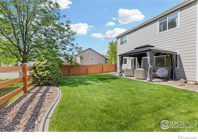 3826 Glenarbor Ln Unit F, Fort Collins, CO 80524 - fenced backyard with a gazebo, an outdoor living space, and a patio area