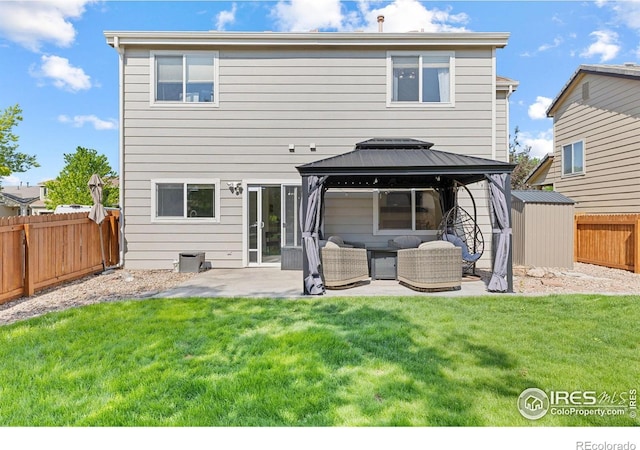 3826 Glenarbor Ln Unit F, Fort Collins, CO 80524 - back of house with an outdoor living space, a gazebo, a patio area, a fenced backyard, and a shed