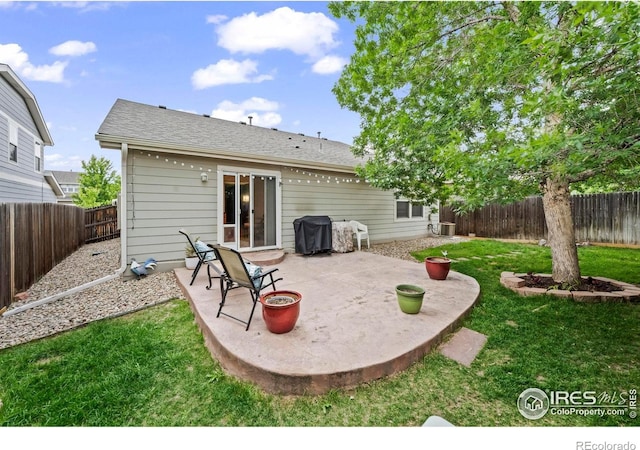 858 Turpin Way, Erie, CO 80516 - back of house featuring a patio, a fenced backyard, and roof with shingles