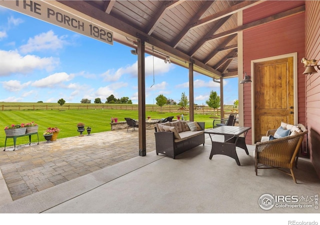 9260 Meadow Farms Dr, Milliken, CO 80543 - view of patio / terrace featuring an outdoor living space with a fire pit and a rural view