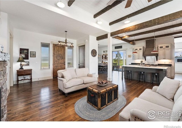 9260 Meadow Farms Dr, Milliken, CO 80543 - living area featuring dark wood-style floors, a wood ceiling with exposed beams, ceiling fan, and a chandelier