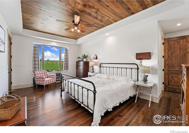 9260 Meadow Farms Dr, Milliken, CO 80543 - bedroom featuring a tray ceiling, wood finished floors, wooden ceiling, recessed lighting, and a ceiling fan