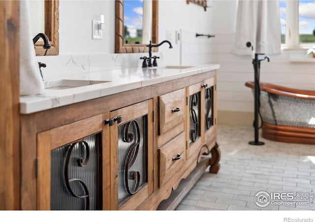9260 Meadow Farms Dr, Milliken, CO 80543 - bathroom featuring a sink