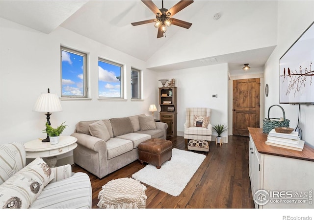 9260 Meadow Farms Dr, Milliken, CO 80543 - living area with a ceiling fan, dark wood-style flooring, and high vaulted ceiling