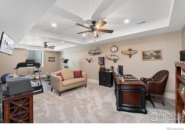 9260 Meadow Farms Dr, Milliken, CO 80543 - office featuring a raised ceiling, a ceiling fan, recessed lighting, and carpet flooring