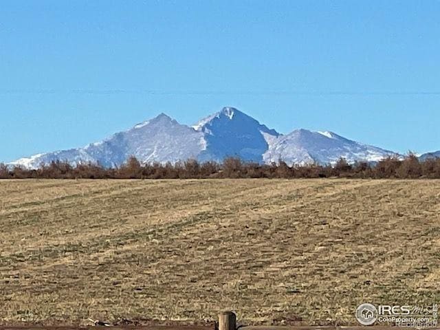 9260 Meadow Farms Dr, Milliken, CO 80543 - view of mountain background with rural landscape