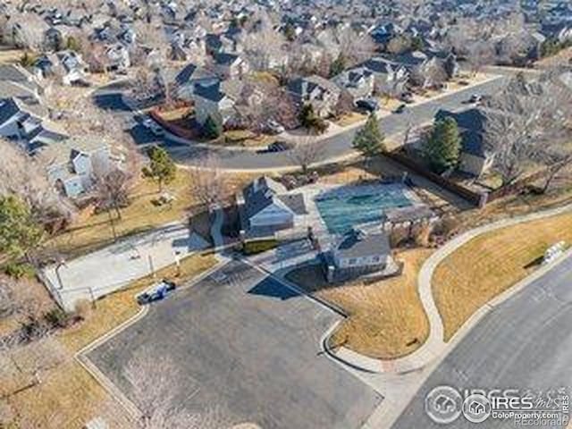 3664 Claycomb Ln, Johnstown, CO 80534 - aerial view of property and surrounding area featuring nearby suburban area